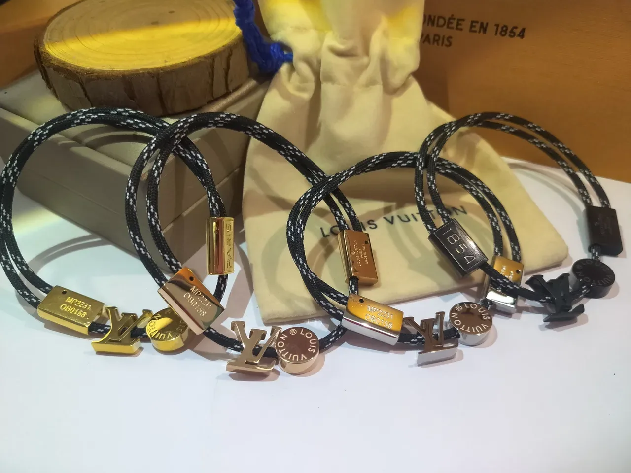 Louis Vuitton LV Circle Bracelet Black and White Braided Cord Rose Gold-Tone Metal Bracelet 6