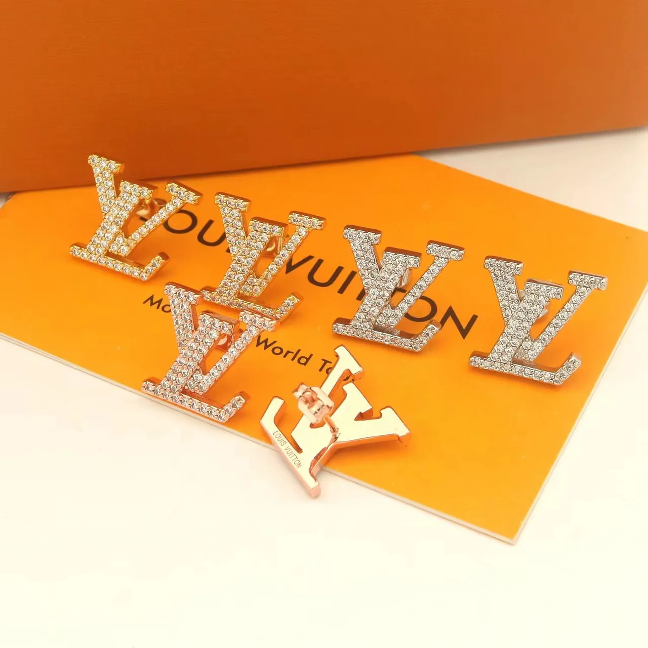 Louis Vuitton LV Monogram Pavé and Polished Gold Stud Earrings 7
