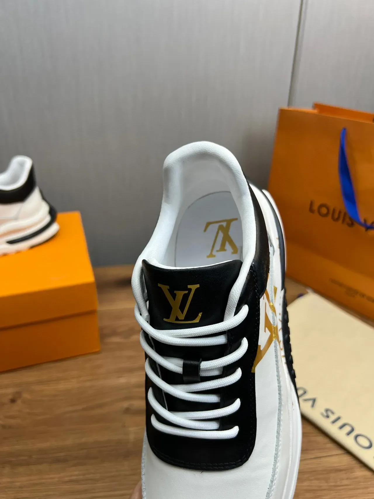 Louis Vuitton LV Trainer White Black Leather Upper Monogrammed Side Panel Lifestyle Sneakers 3