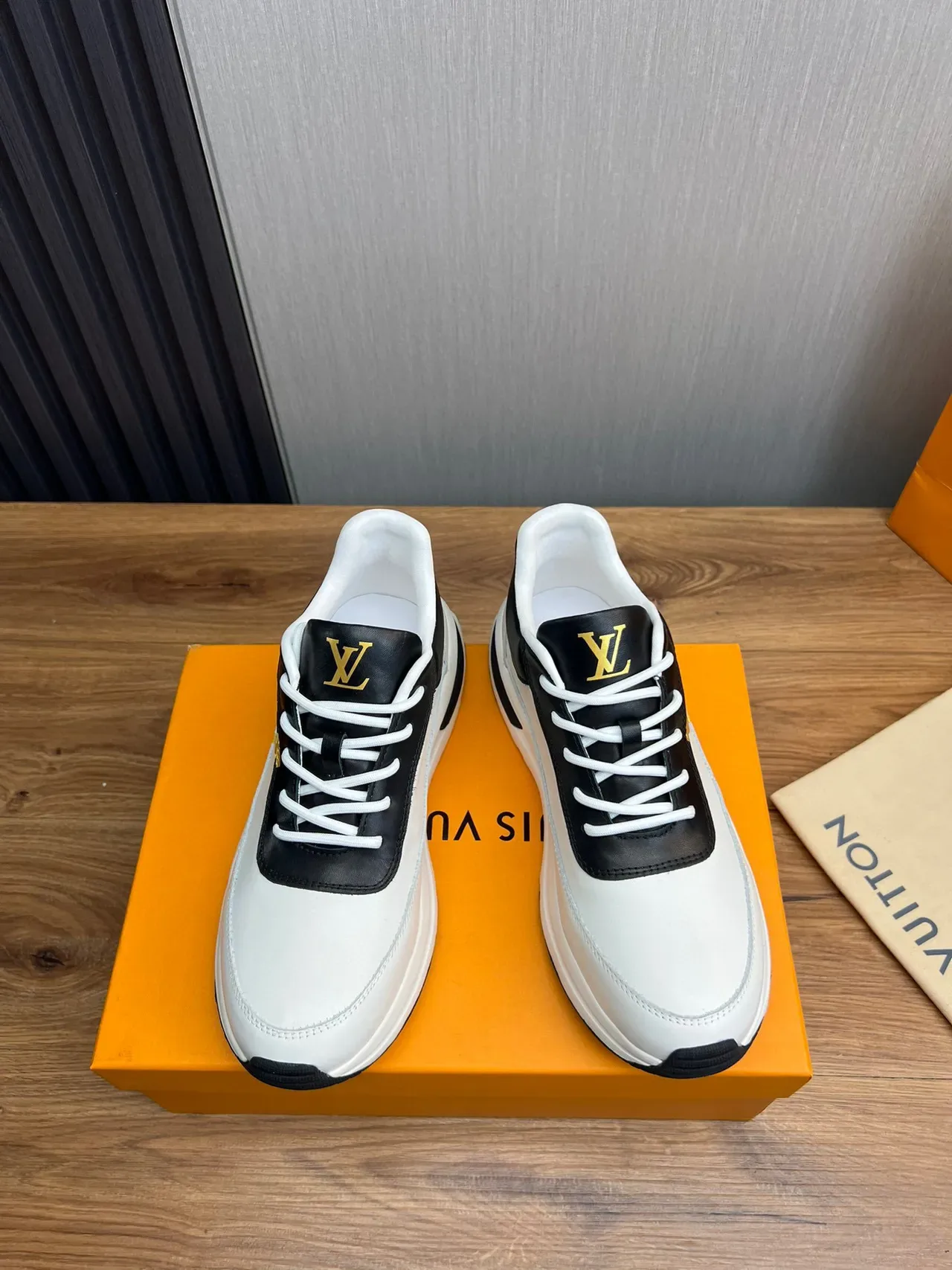 Louis Vuitton LV Trainer White Black Leather Upper Monogrammed Side Panel Lifestyle Sneakers 9
