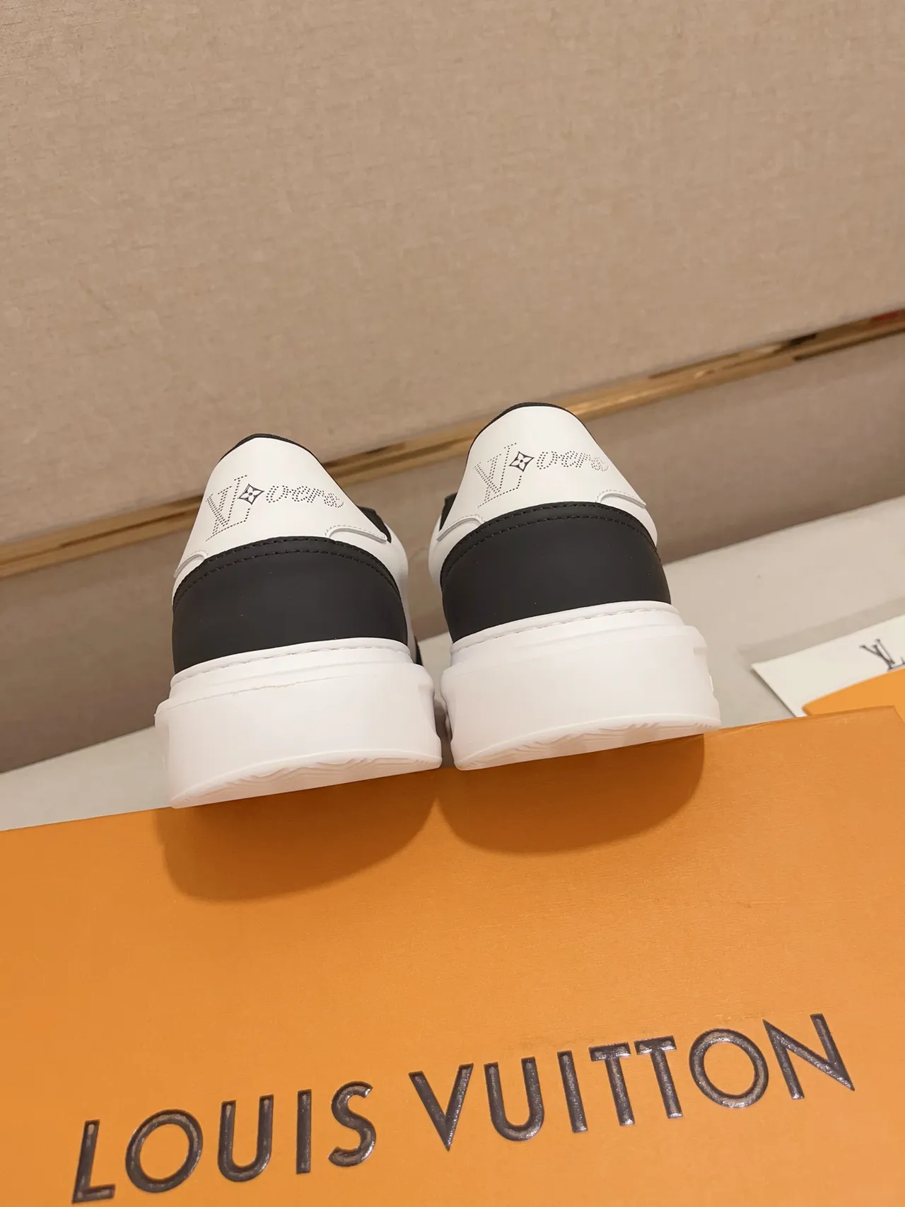 Louis Vuitton LV Trainer White Black Perforated Monogram Two-Tone Leather Lifestyle Sneakers 3