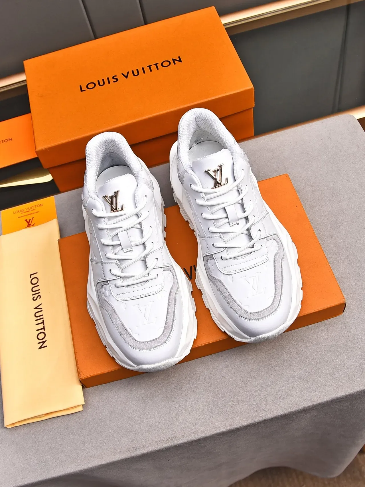 Louis Vuitton LV Trainer White Gray Monogram-Embossed Leather Sculpted Sole Chunky Sneakers 3