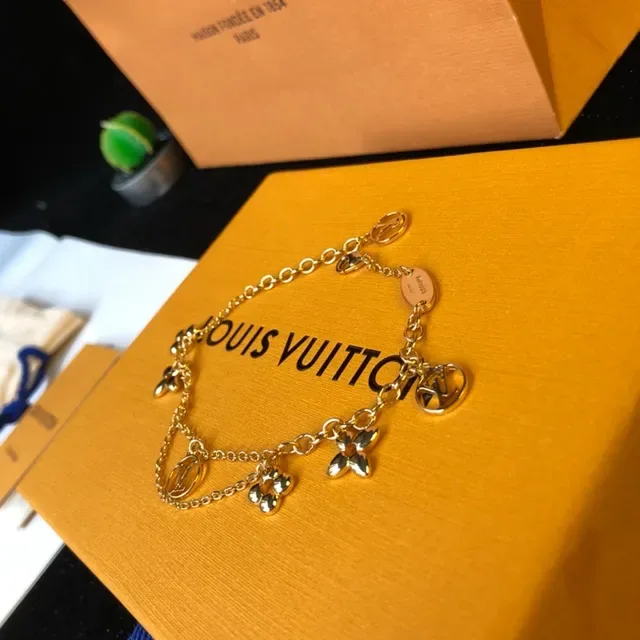 Louis Vuitton Multi-Charm Bracelet Gold Chain Design Bracelet 7
