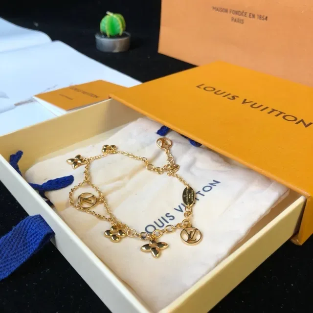 Louis Vuitton Multi-Charm Bracelet Gold Chain Design Bracelet 9