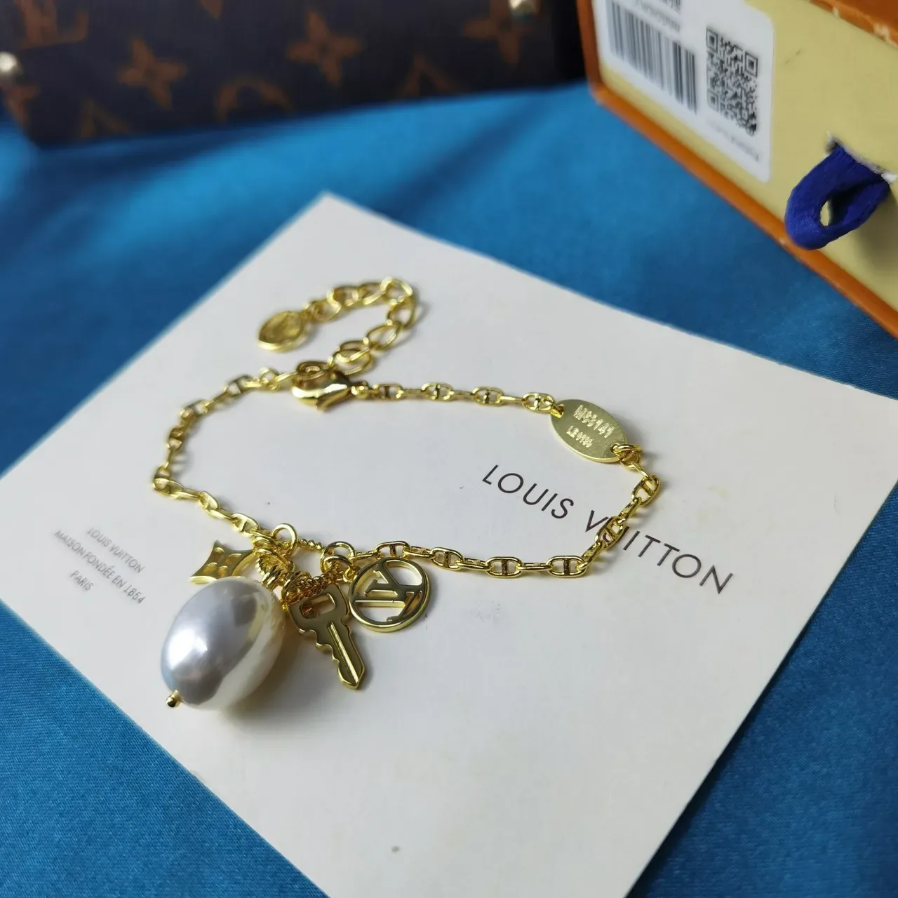 Louis Vuitton Multi-Charm Gold White Chain Link Baroque Pearl Pendant Bracelet 5