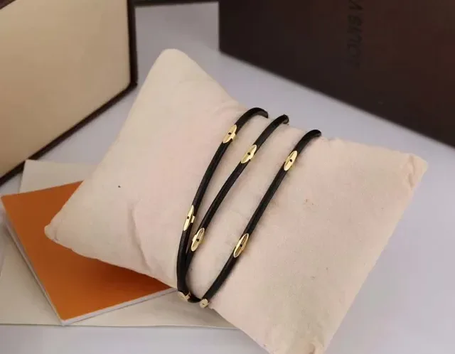 Louis Vuitton Multi-Wrap Black Cord and Gold-Tone Bracelet 4