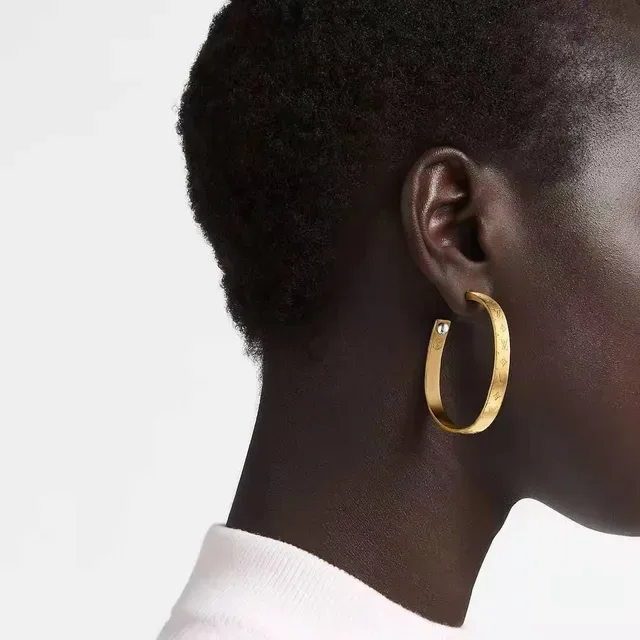 Louis Vuitton Nanogram Engraved Gold-Tone Hoop Earrings 9