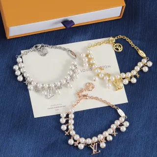 Louis Vuitton Pulsera de plata y oro con perlas y charm de monograma