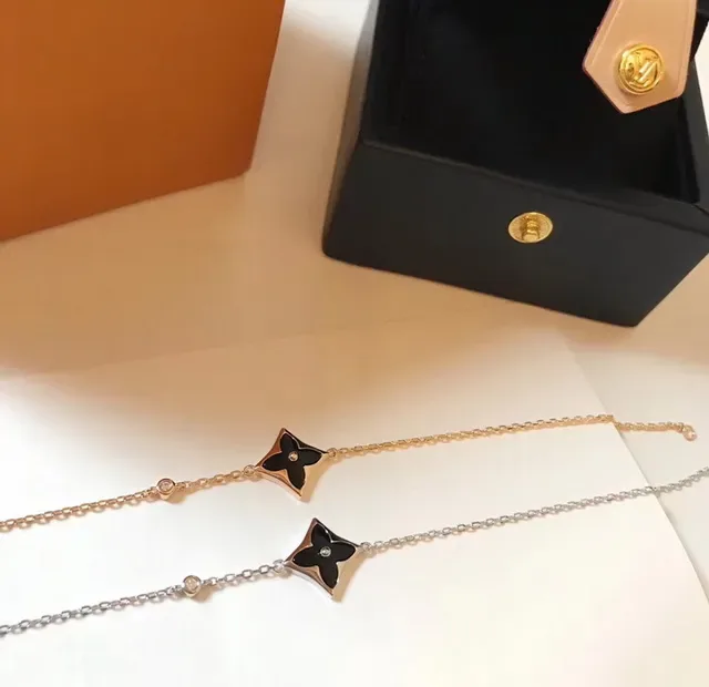 Louis Vuitton Silver White Chain Quatrefoil Pendant Bracelet 3