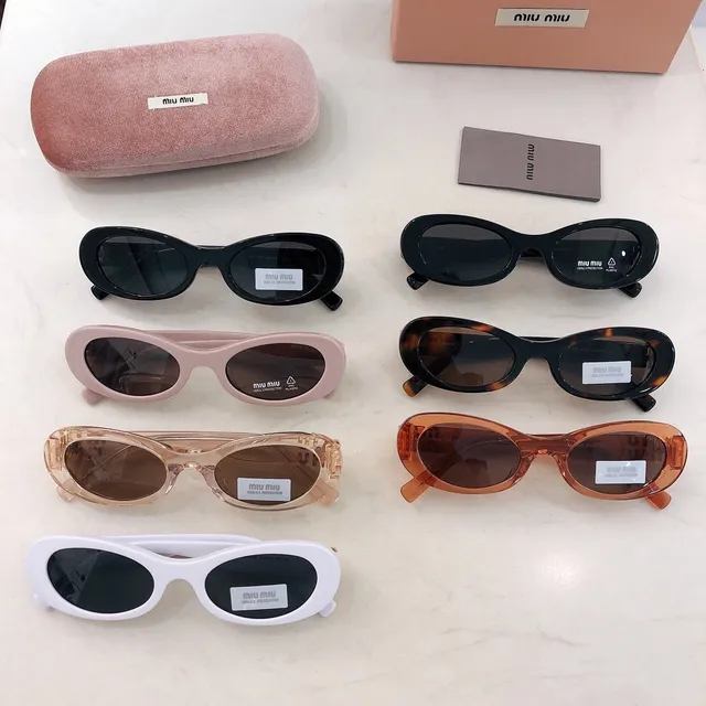 Miu Miu preto cinza oval silhueta brilhante acetato óculos de sol 3