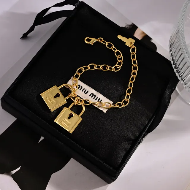 Miu Miu Bracelet à Charme avec Double Cadenas Doré 2