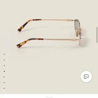 Miu Miu Regard نظارات شمسية ذهبية وتورتواز شيل