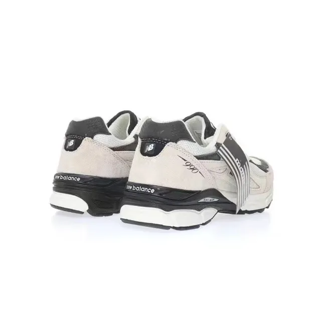 New Balance 990 beige noir partie supérieure en suédé et maille superposée N Logo sneakers lifestyle 6