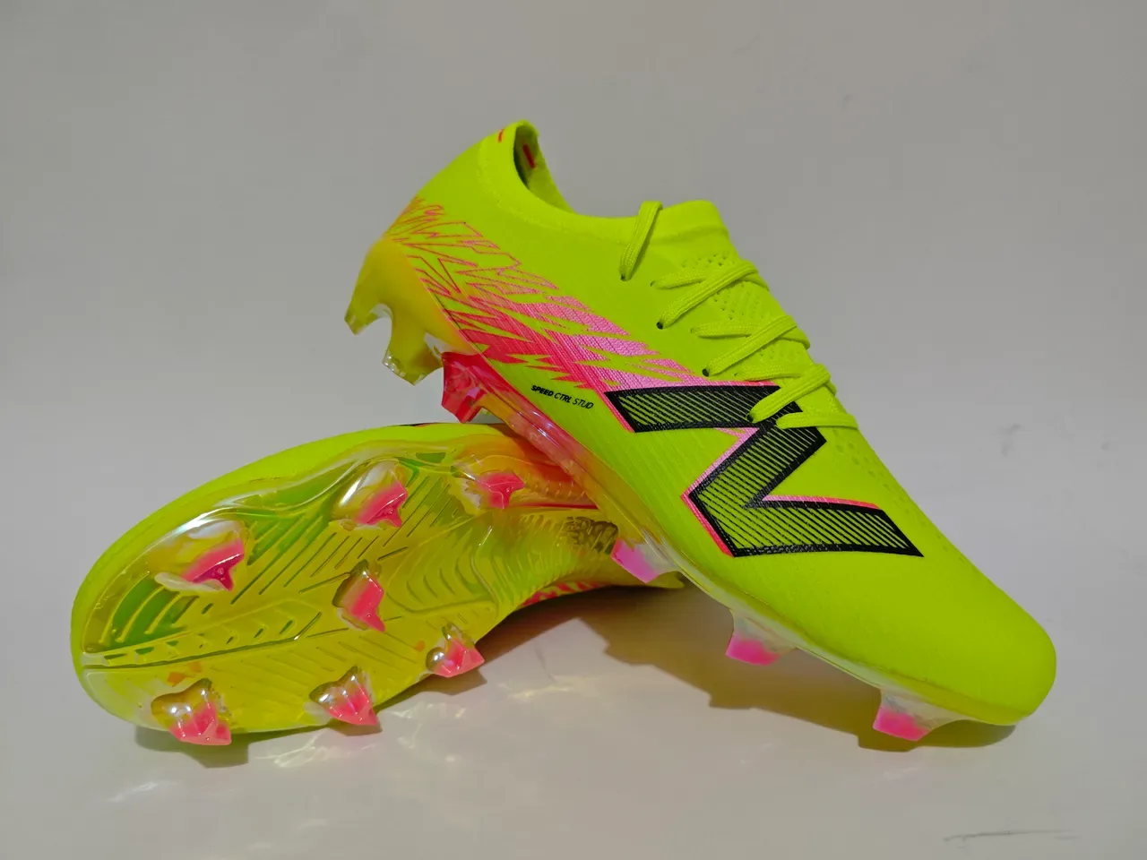 New Balance Chaussures de football blanc et or low-cut upper maille graphique lightning terrain ferme 6