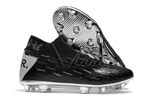 Nike Chaussures de football à tige en jersey noir multicolor à talons bas pour terrain ferme 9
