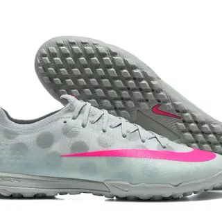 Nike Zapatos de fútbol de césped gris y rosa de corte bajo con upper sintético textura translúcida con motivos de puntos