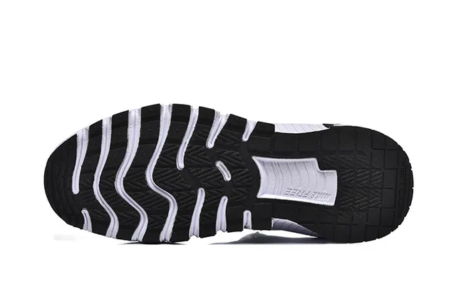 Nike White and Black Ribbed Midsole Lifestyle Sneaker 5