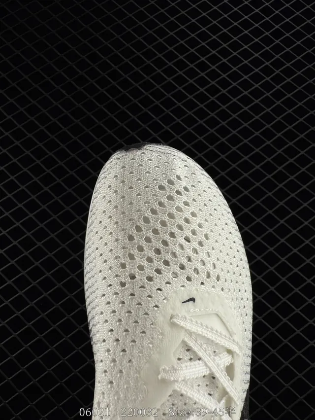 Nike ZoomX White Black Engineered Knit Upper Asymmetric Lacing Running Shoes 2