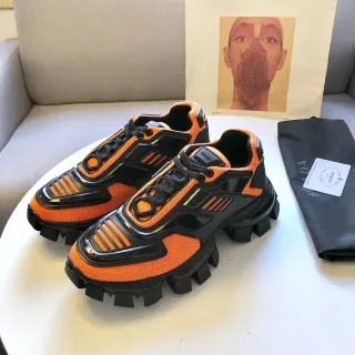Prada Cloudbust أحذية رياضية برتقالي وأسود سميكة