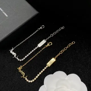 Saint Laurent فضي وذهبي Interlocking YSL Monogram Pave Crystal Line سوارة