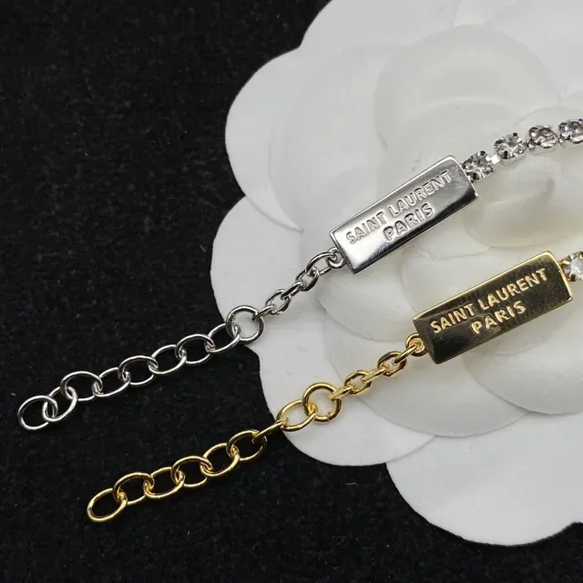 Saint Laurent فضي وذهبي Interlocking YSL Monogram Pave Crystal Line سوارة 2