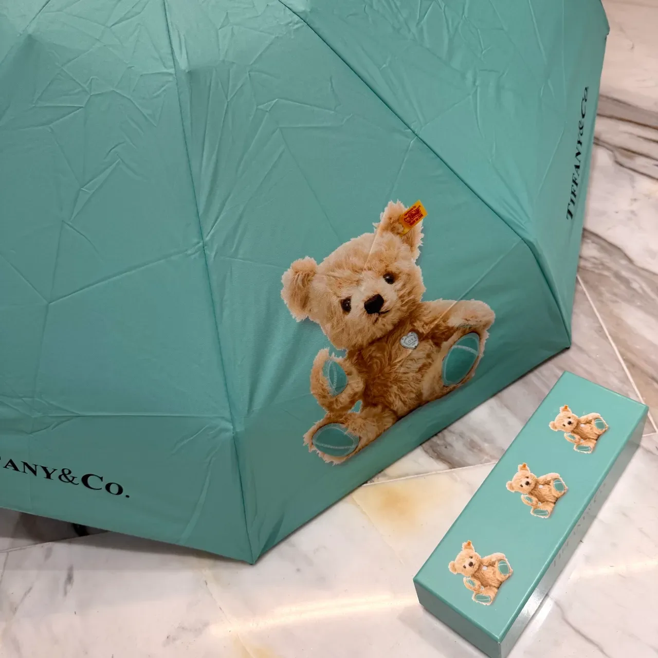 Tiffany & Co. Bolso Canopy estampado de oso de peluche azul beige 4