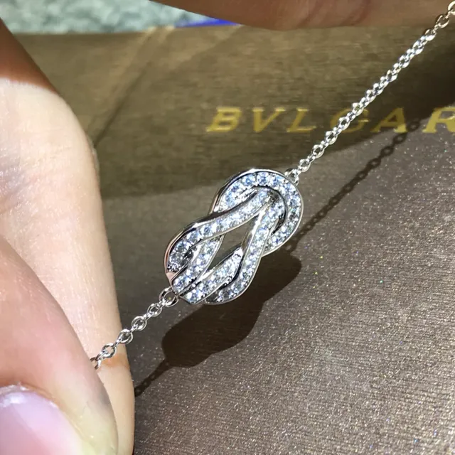 Tiffany & Co. nœud or argent pendentif diamants Pavé-Set bracelet 4