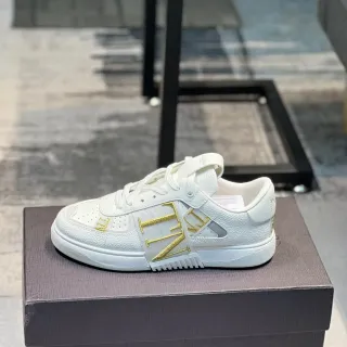 Valentino VLTN Sneaker White Gold Textured Leather Upper Strap Detail Lifestyle Sneakers