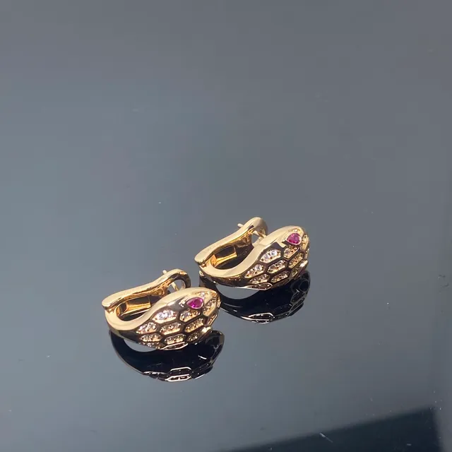 Van Cleef & Arpels Serpent Bohème Yellow Gold Diamond and Ruby Earrings 2