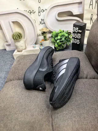 Adidas All-Black Three-Stripe Lifestyle Sneakers 6
