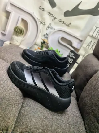 Adidas All-Black Three-Stripe Lifestyle Sneakers 7