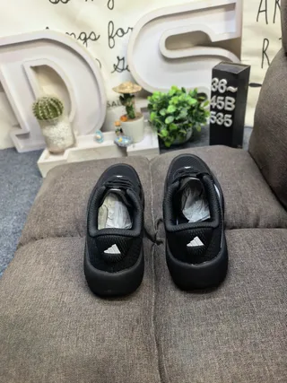 Adidas All-Black Three-Stripe Lifestyle Sneakers 8