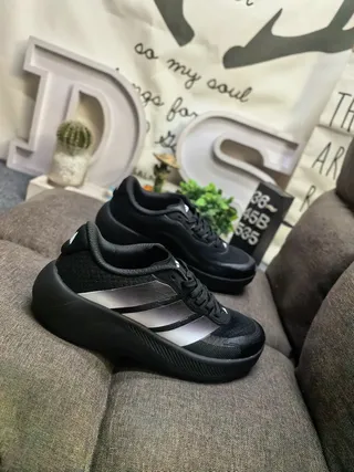 Adidas All-Black Three-Stripe Lifestyle Sneakers 9