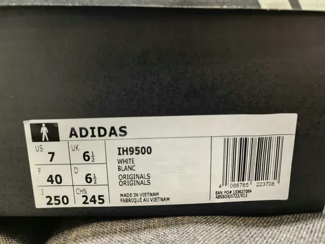 Adidas Black and White Three-Stripe Lifestyle Sneakers 12