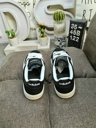 Adidas Black and White Three-Stripe Lifestyle Sneakers 8