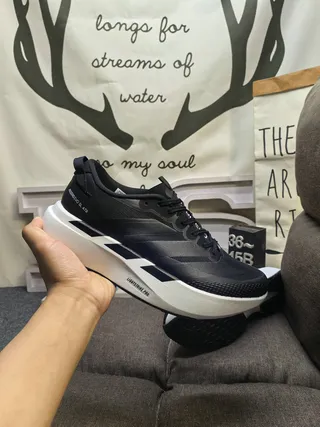 Adidas Chaussures de course en maille et synthétique noir blanc semelle intermédiaire sculptée épaisse 5
