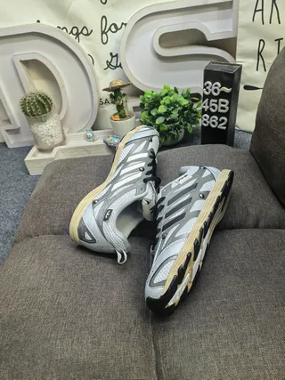 Adidas Three-Stripe Mesh and Synthetic Low-Top Lifestyle Sneakers 6
