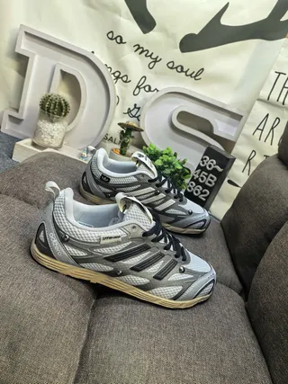 Adidas Three-Stripe Mesh and Synthetic Low-Top Lifestyle Sneakers 9