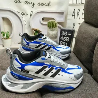 Adidas सफेद नीली लेयर्ड मिडसोल असममित वेव स्कल्प्टिंग चंकी स्नीकर्स