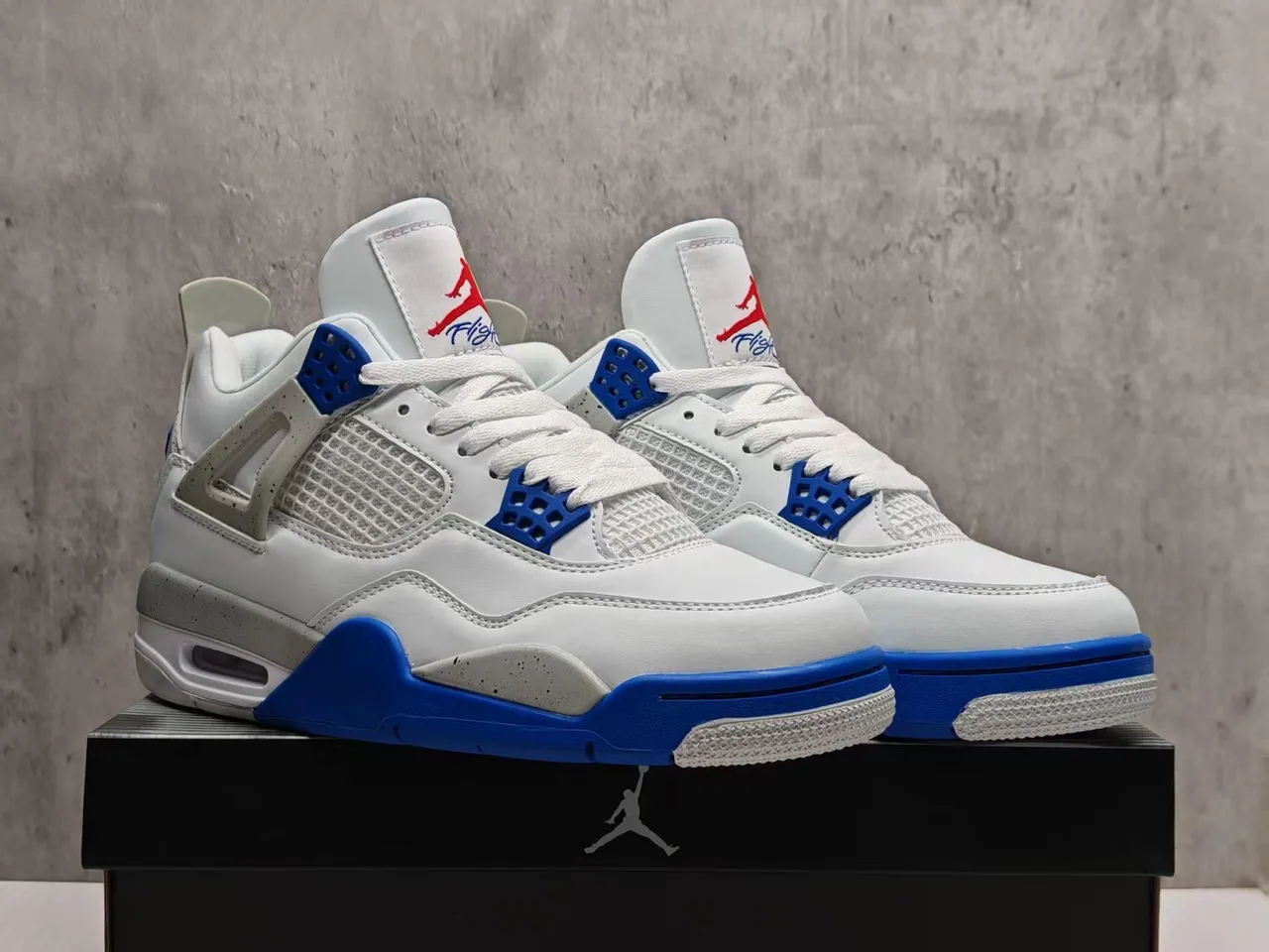 Chaussures de basketball Air Jordan 4 Blanc Bleu Royal Ciment 9