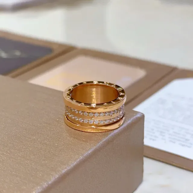 Bvlgari خاتم ذهبي شفاف متعدد الأشرطة دوار تصميم حجريات مرصعة بالباڤيه 4