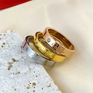 Cartier Gold Silver Engraved Cursive Logo Single-Stone Accent Ring