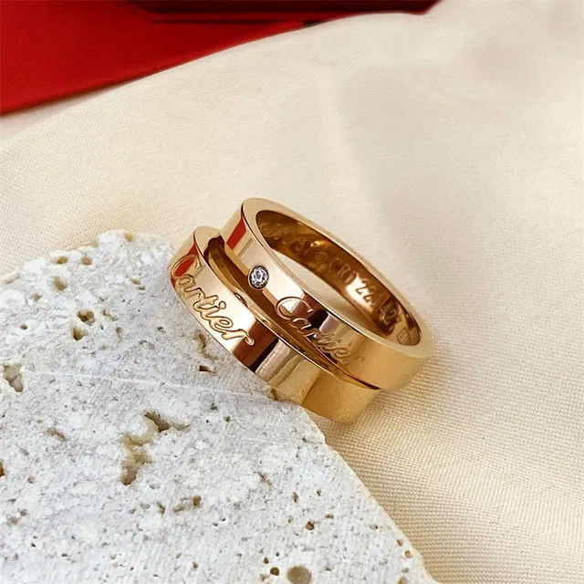 Cartier Gold Silver Engraved Cursive Logo Single-Stone Accent Ring 3