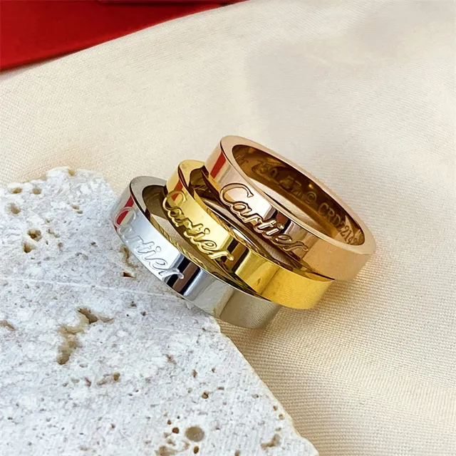 Cartier Gold Silver Engraved Cursive Logo Single-Stone Accent Ring 4