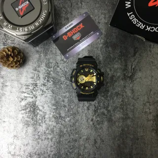 Casio G-Shock GA-100 Reloj deportivo negro y dorado