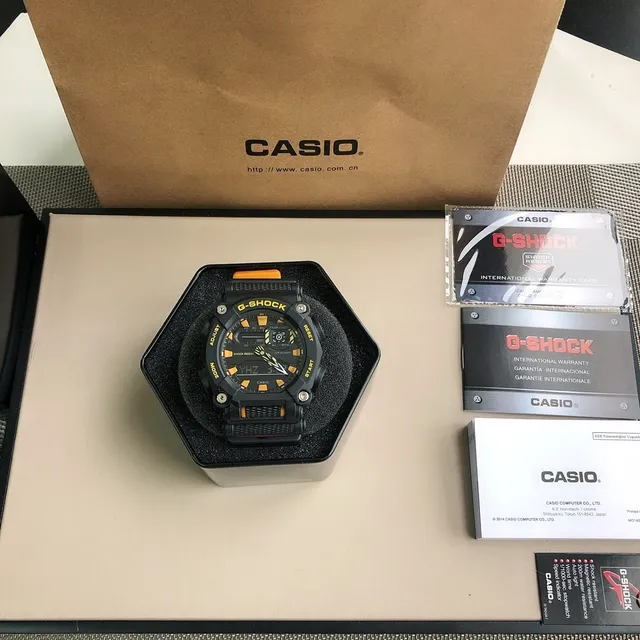 Casio G-Shock GA-100 Montre Sportive Noire et Jaune 6