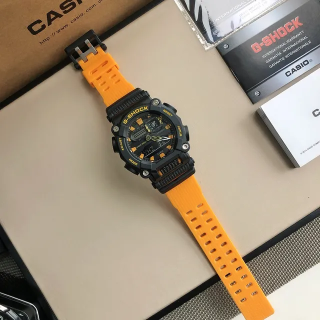 Casio G-Shock GA-100 Montre Sportive Noire et Jaune 8