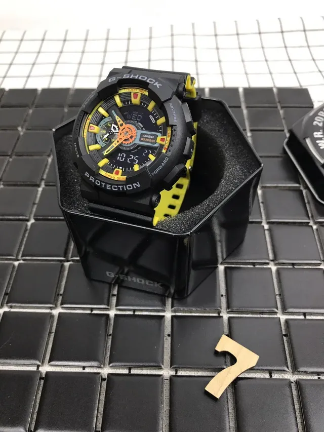 Casio G-Shock GA-100 Noir et Jaune Montre Sport 3