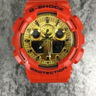 Casio G-Shock GA-100 Orange and Gold Sports Watch