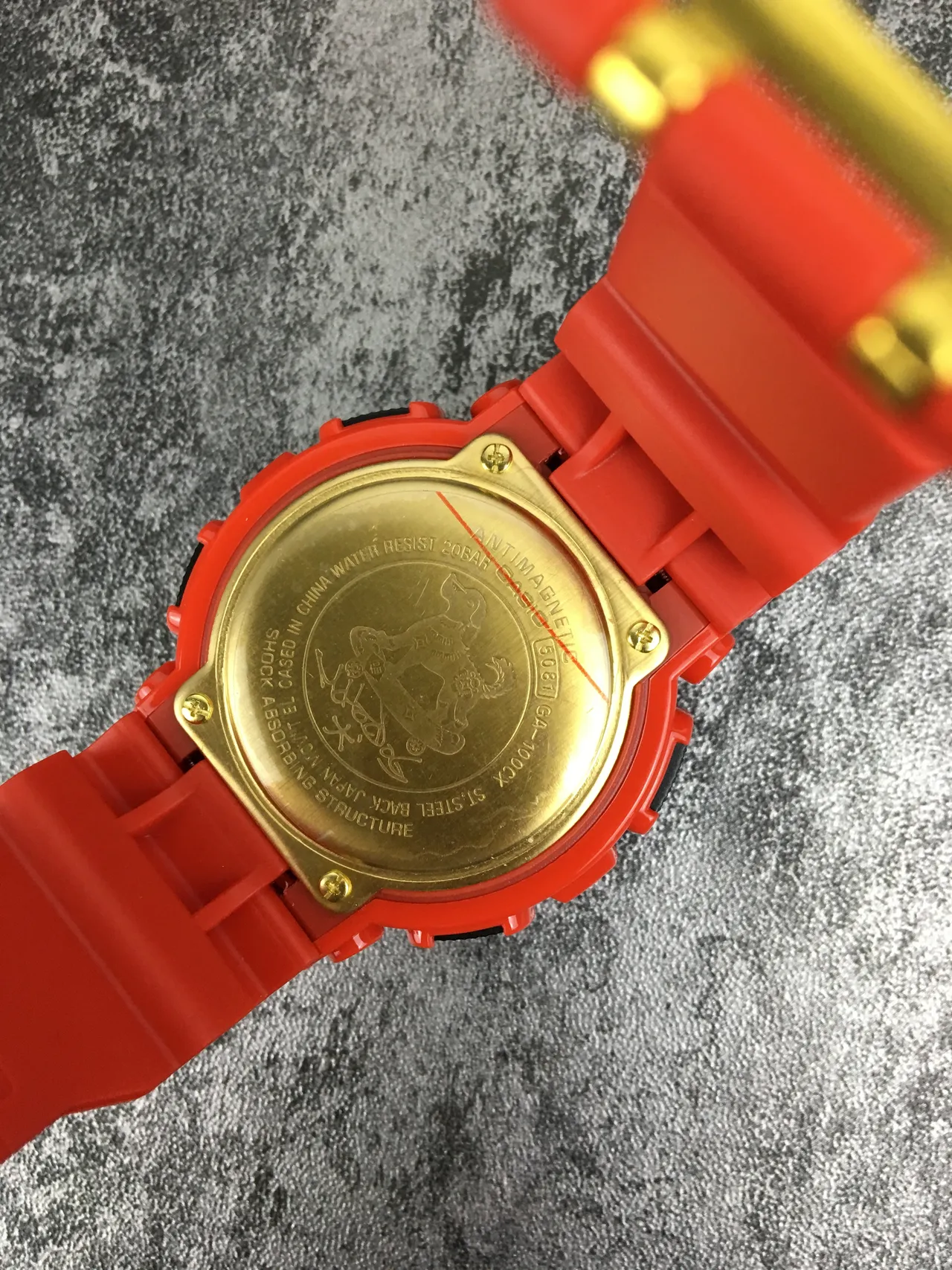 Casio G-Shock GA-100 Orange and Gold Sports Watch 3
